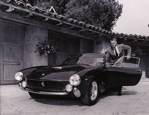 Appraisal: A photograph of Steve McQueen and his Ferrari GT Lusso