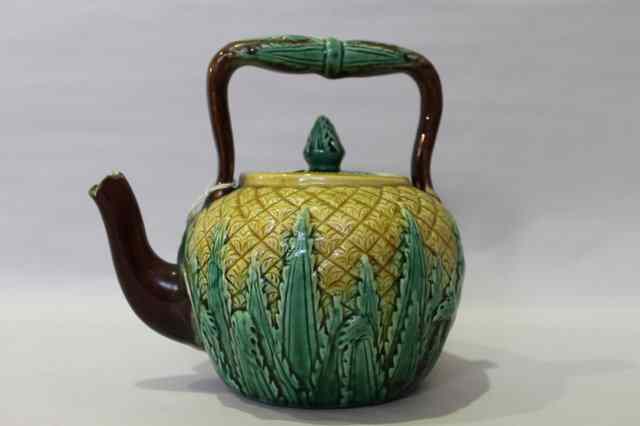 Appraisal: A MAJOLICA TEAPOT and cover with grasses design to the