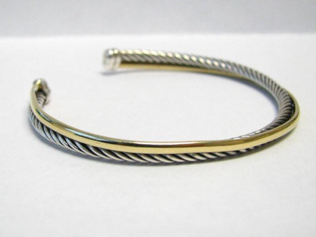 Appraisal: David Yurman Sterling Silver and K yellow bonded gold crossover