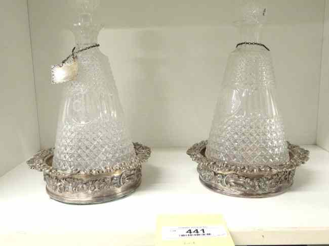 Appraisal: Pair crystal decanters with stoppers one stopper damaged sterling silver