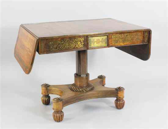 Appraisal: A Regency brass inlaid rosewood sofa table with two drawers