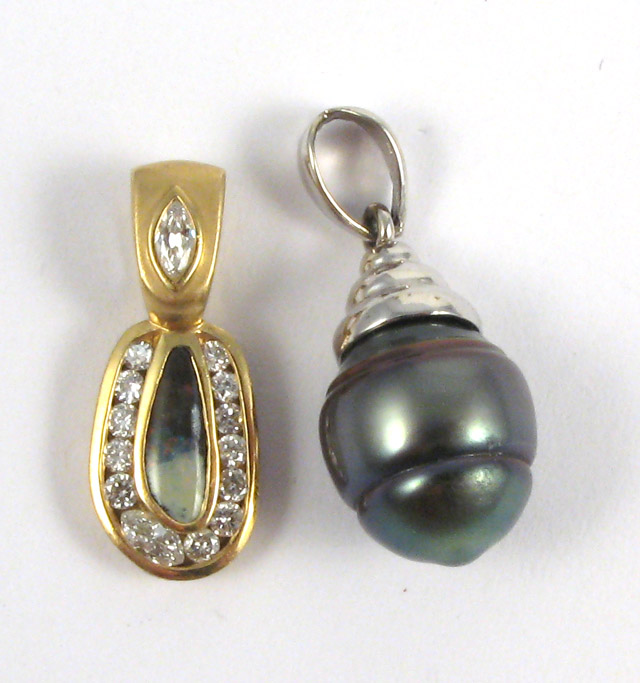 Appraisal: TWO PENDANTS single black pearl and K white gold diamond