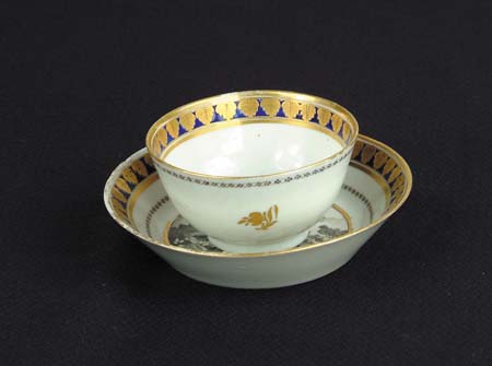 Appraisal: EXPORT DECORATED HANDLESS CUP AND SAUCER Saucer and cup is