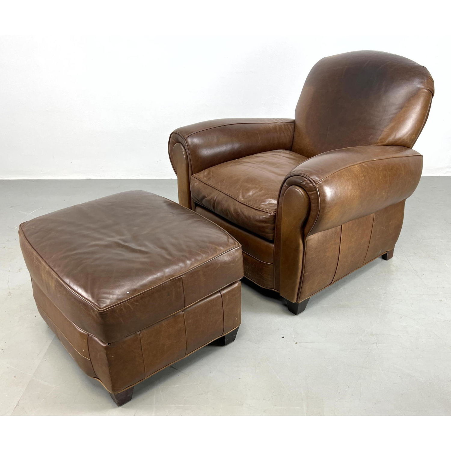 Appraisal: CLASSIC Leather Club Lounge Chair and Ottoman Dimensions H inches