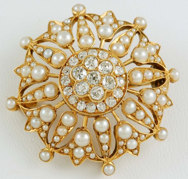 Appraisal: Diamond and pearl star pin in approximately K yellow gold