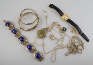 Appraisal: Lot containing three white metal bangles one set with lapis