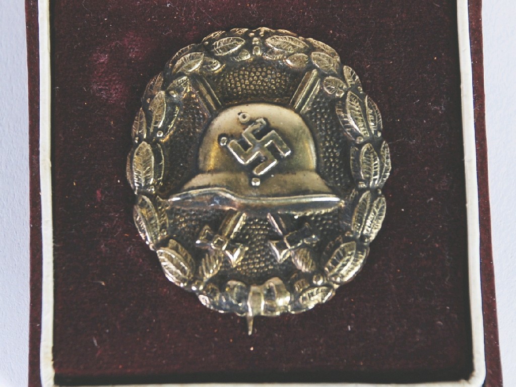 Appraisal: SPANISH ' TYPE st CLASS NAZI WOUND BADGE complete with