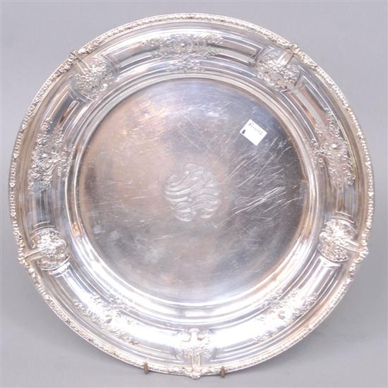 Appraisal: STERLING SILVER CIRCULAR CHARGER The rim with raised floral baskets