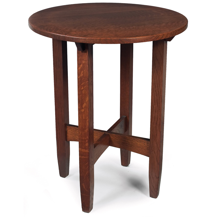 Appraisal: Limbert table similar to circular top above an arched cross-stretcher