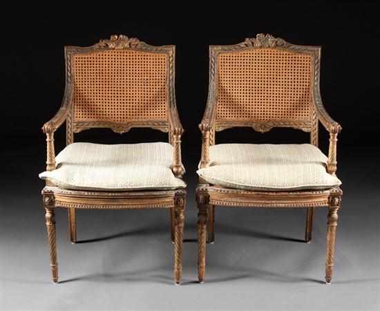 Appraisal: Pair of Louis XVI style carved giltwood and caned fauteuils