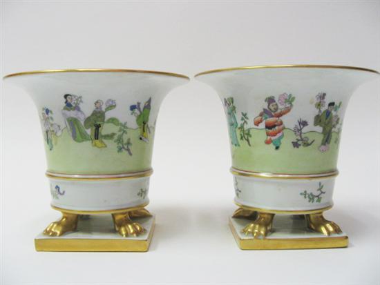 Appraisal: Pair Herend Cache Pots with Asian figures in landscape gilt