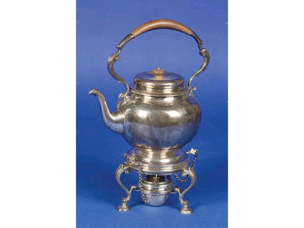 Appraisal: A KETTLE ON STAND of circular bellied form with a