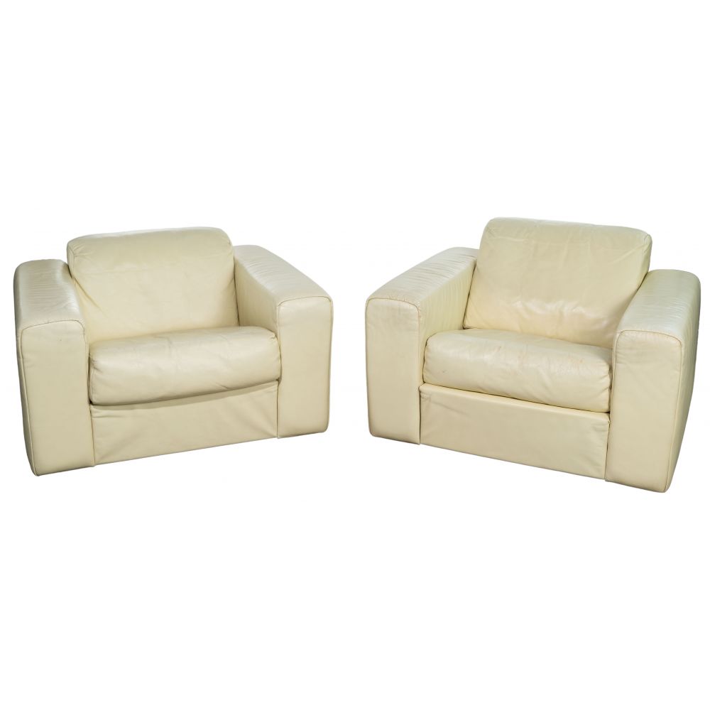 Appraisal: STENDIG INDUSTRIES LEATHER CHAIRSPair of cube style club chairs having