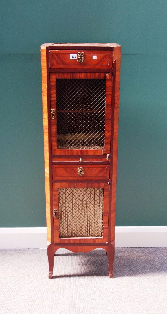 Appraisal: A late th century French kingwood tall narrow side cabinet