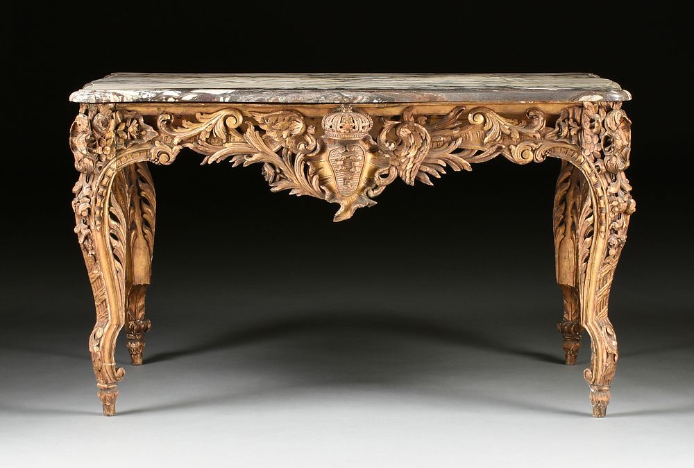 Appraisal: A LOUIS XV STYLE MARBLE TOPPED GILTWOOD TABLE DE MILIEU