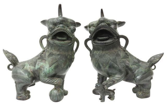 Appraisal: pair Bronze horned foo lions in a verdigris patina depicted