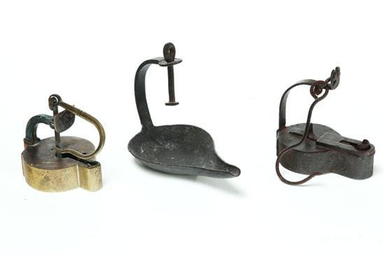 Appraisal: THREE LAMPS American th century Two wrought iron open pan