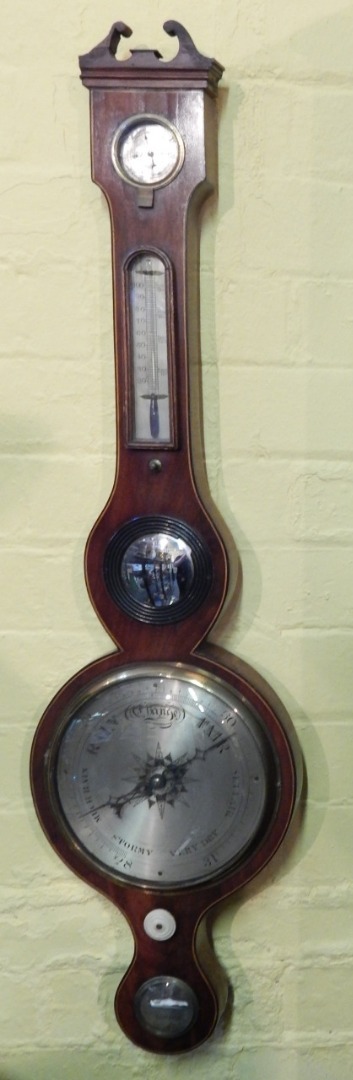 Appraisal: A mid thC mahogany barometer by M E Levin of