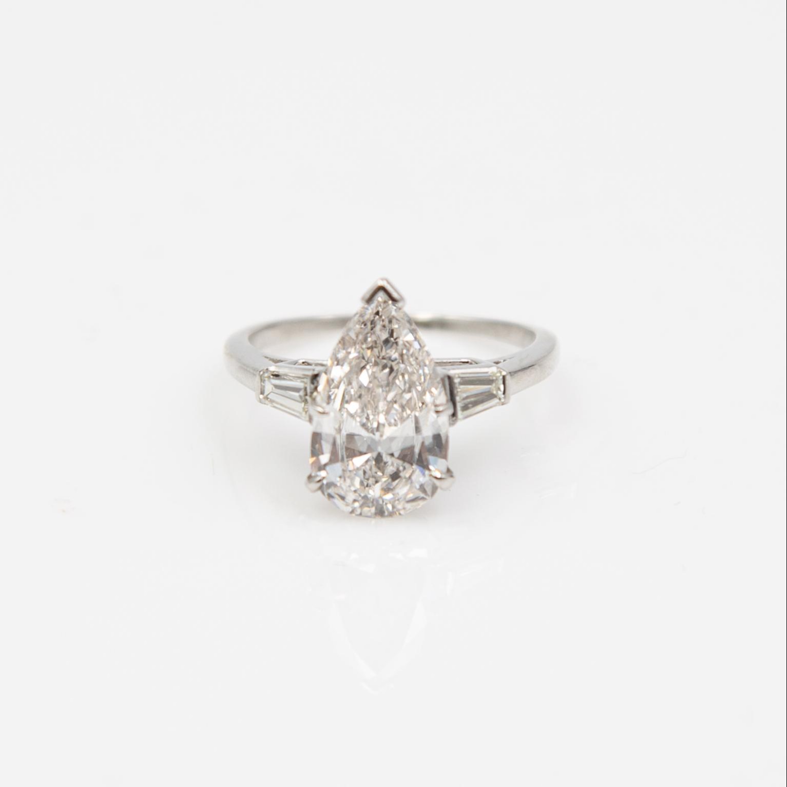 Appraisal: CT PEAR SHAPED DIAMOND RING WITH PLATINUM AND DIAMOND BAND