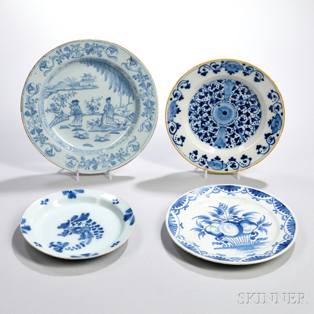 Appraisal: Four English Blue and White Delft Plates late th and