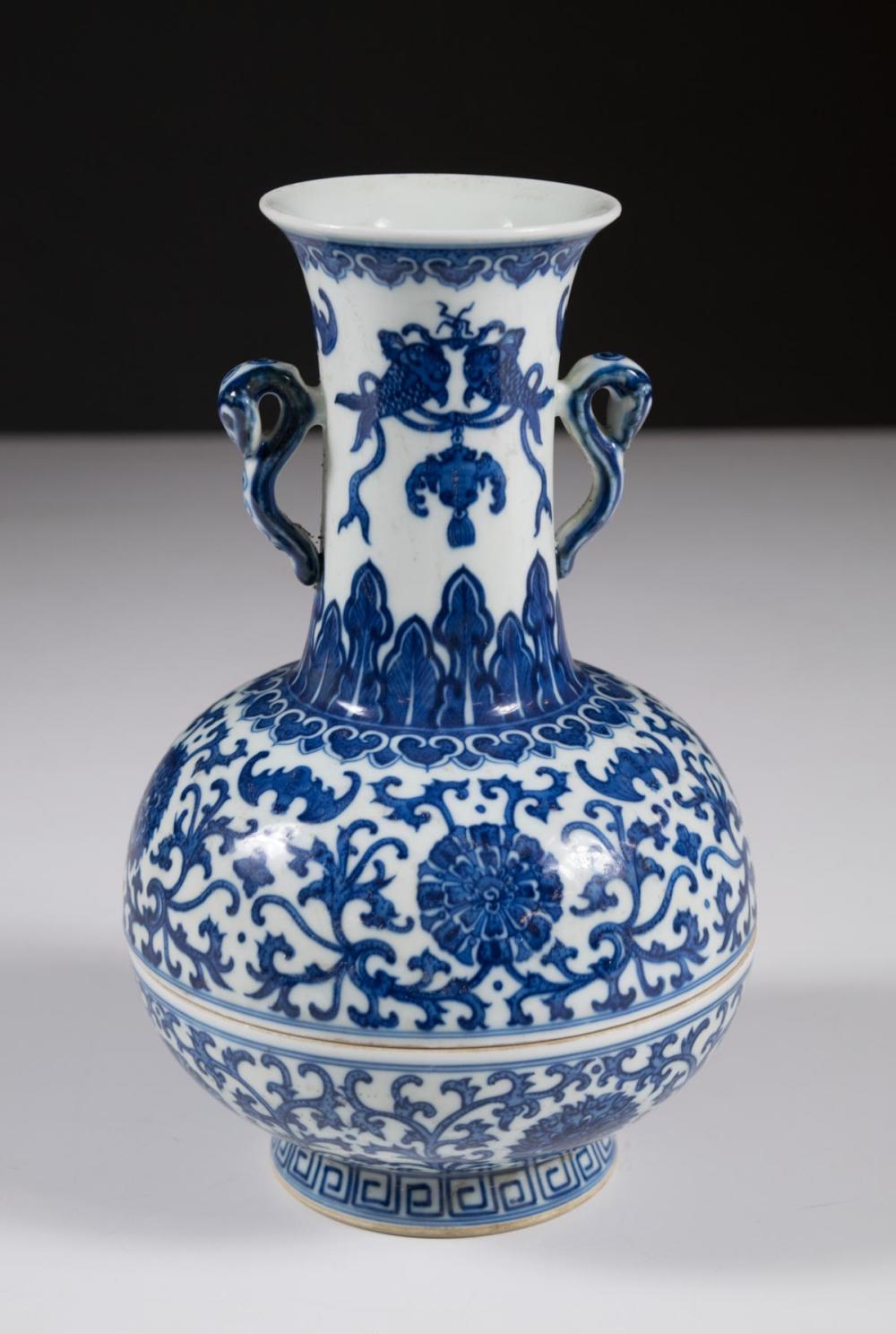 Appraisal: CHINESE BLUE AND WHITE PORCELAIN VESSEL two-piece bottle form with