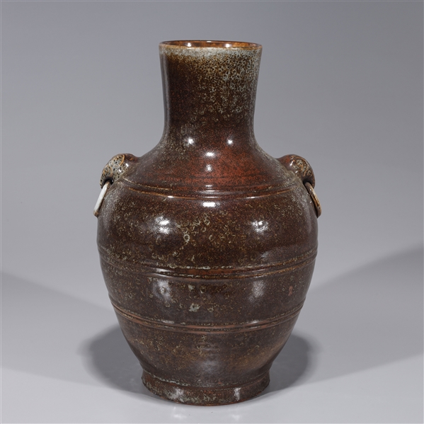 Appraisal: Chinese brown glazed ceramic vase with elephant handles six-character Yongzheng