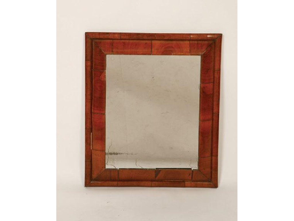 Appraisal: A GEORGE I WALNUT CUSHION-MOULDED WALL MIRROR the rectangular plate