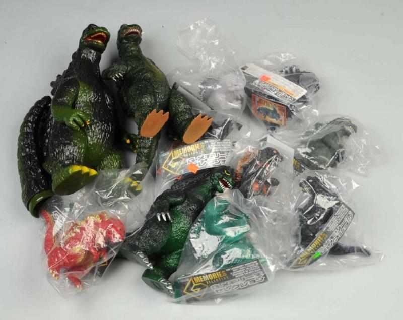 Appraisal: Lot of Godzilla Soft Vinyl Figures Description Includes one Slash