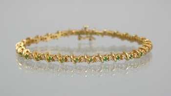 Appraisal: A Ladies' Emerald and Diamond Bracelet k yellow gold bracelet