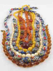 Appraisal: A mixed lot comprising seven necklaces including coral and Italian