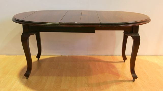 Appraisal: A stained maple extension dining table cm long cm wide