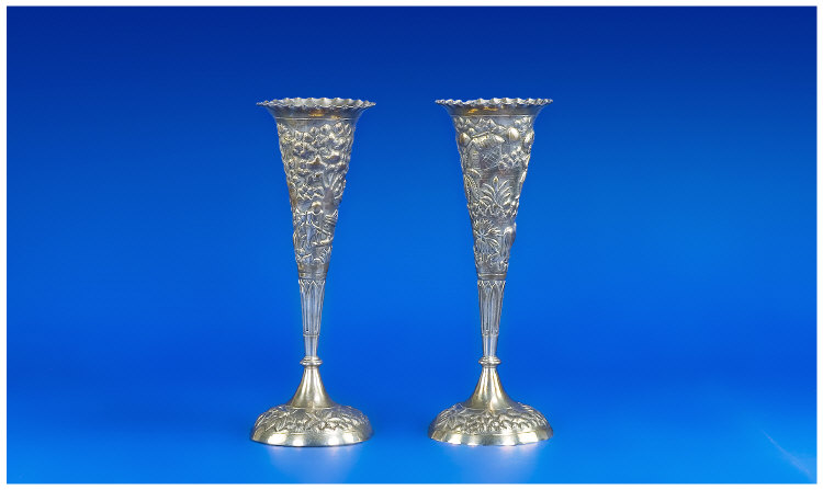 Appraisal: Pair Of Tapering Vases Heavily Embossed With Village Homelife Scenes