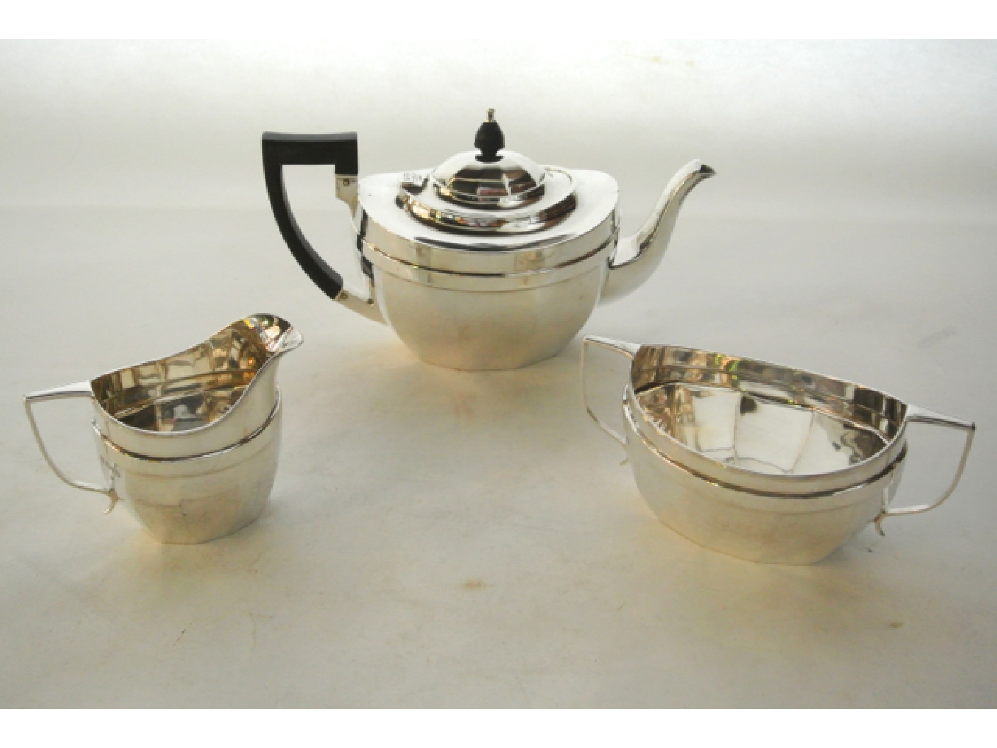 Appraisal: A George V silver three-piece tea set Herbert Edward Barker