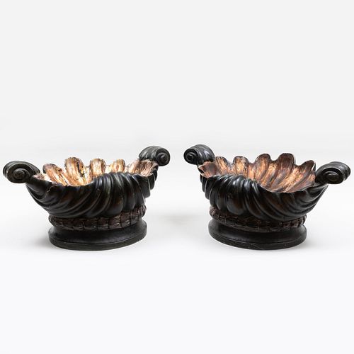 Appraisal: PAIR OF CONTINENTAL SILVER-GILT POLYCHROMED WOOD SHELL CENTERPIECES WITH DUTCH