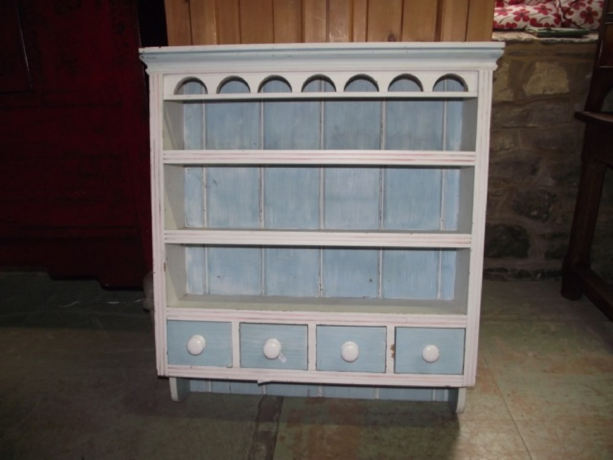 Appraisal: A small pine kitchen hanging plate rack with later painted