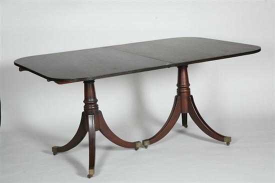 Appraisal: DOUBLE PEDASTAL DUNCAN PHYFE STYLE DINING TABLE In mahogany with