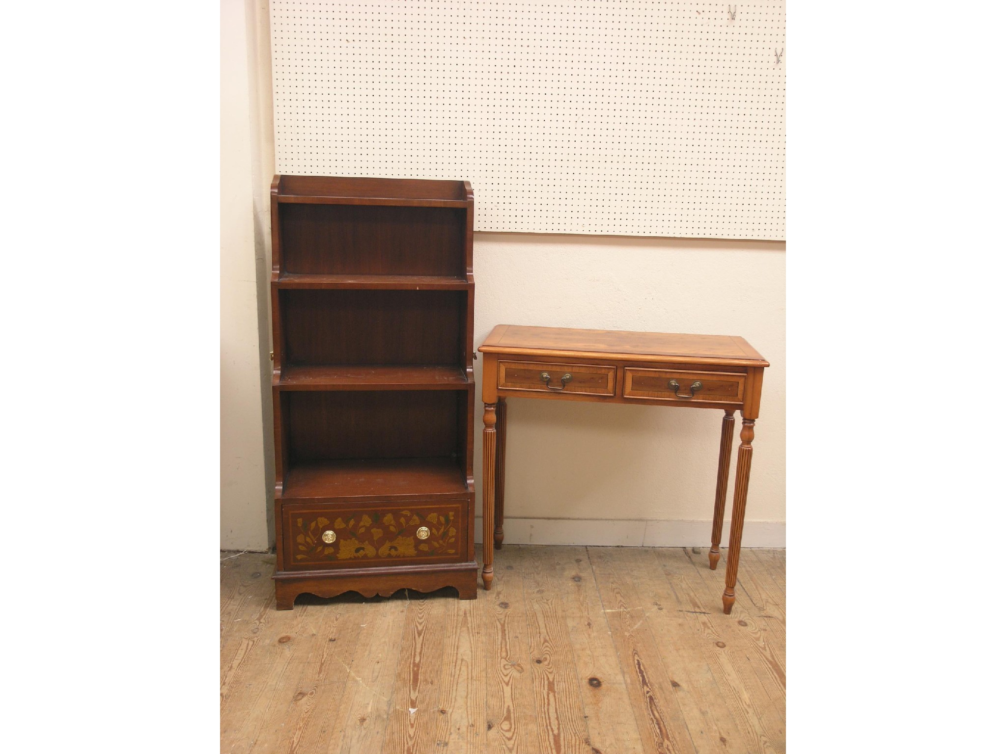 Appraisal: A reproduction mahogany waterfall bookcase three open shelves and marquetry