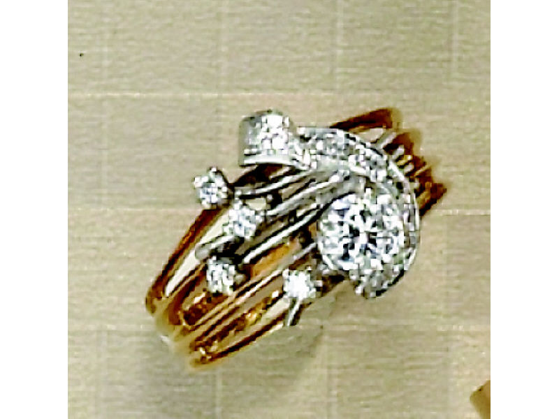 Appraisal: DIAMOND RING Lady's k two tone gold diamond ring featuring