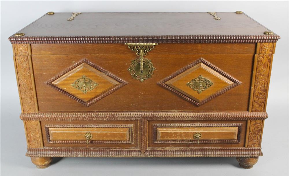 Appraisal: PORTUGUESE FRUITWOOD BLANKET CHEST the hinged top opening above decorative