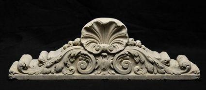 Appraisal: CARVED STONE OVERDOOR With scalloped shell central decoration x x