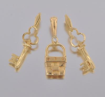 Appraisal: Three k Gold Charms Containing two k gold skeleton keys