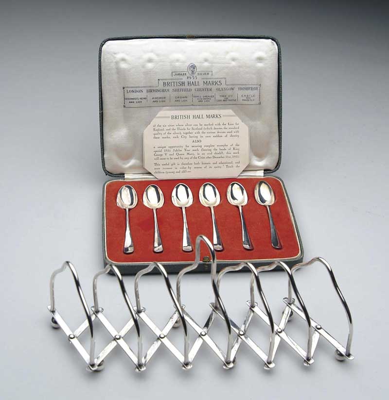 Appraisal: SET OF BRITISH STERLING SILVER SPOONS AND TOAST RACK Cased