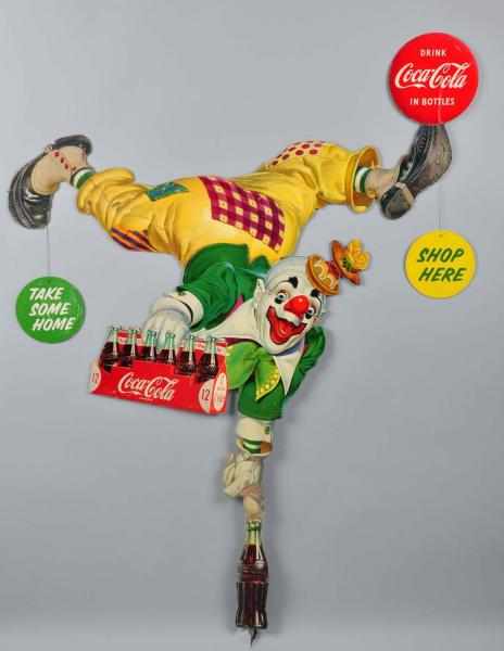 Appraisal: Coca-Cola Two-Sided Clown Display Description Five pieces total Legs slide