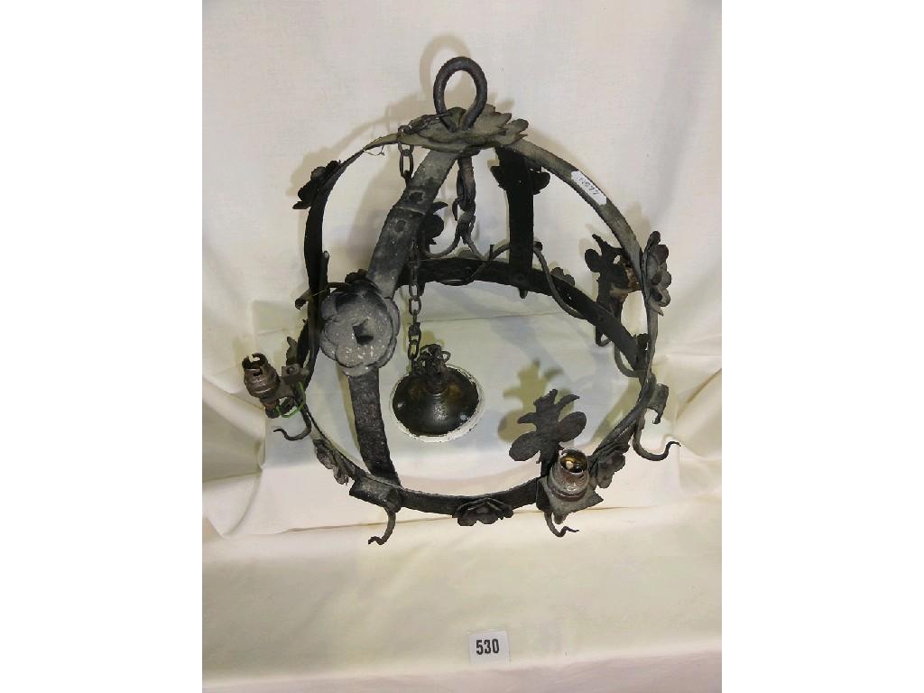 Appraisal: A wrought iron game hanger with later light conversion together