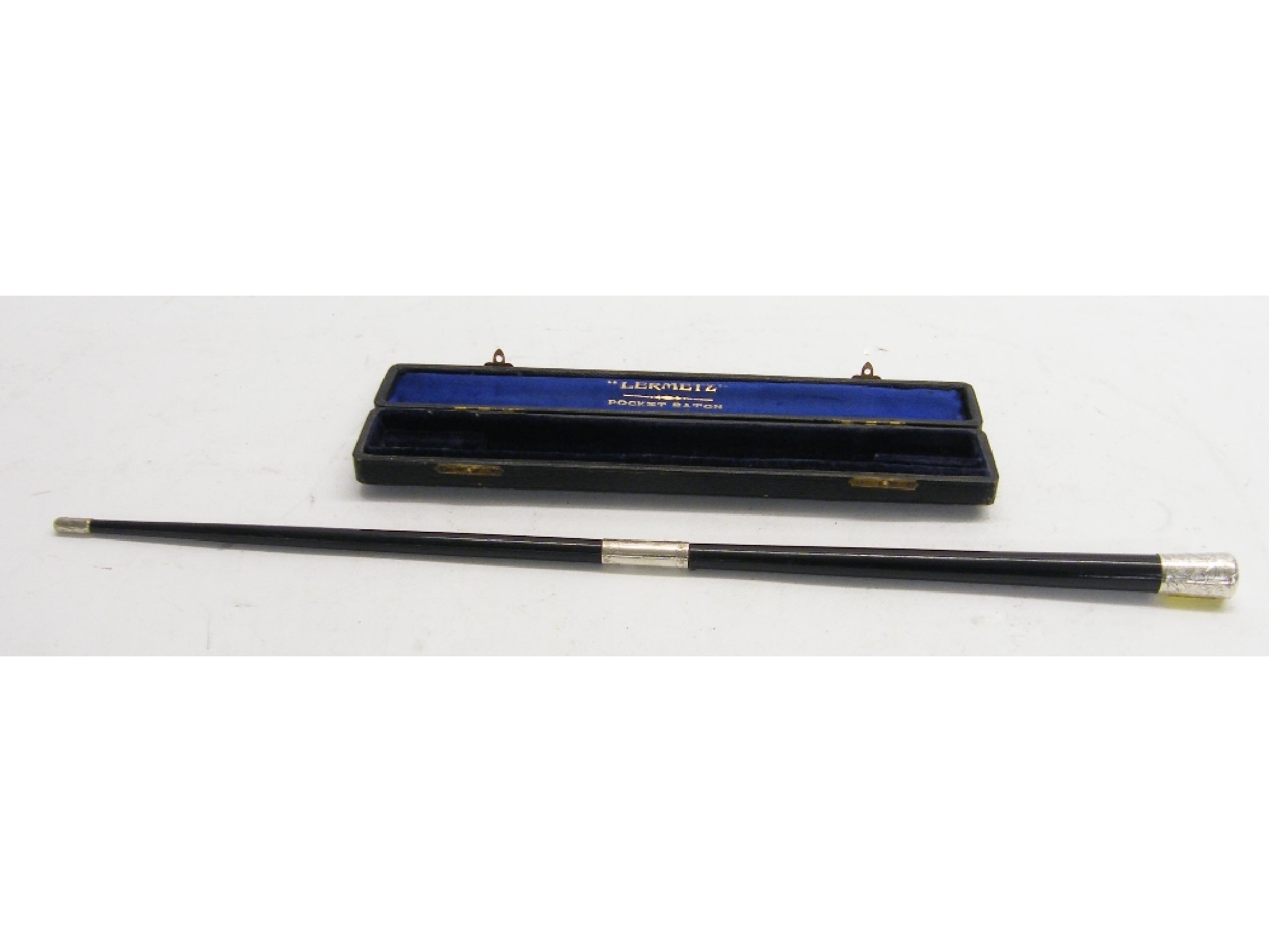 Appraisal: Ebonised silver collared two-section pocket baton within a fitted case