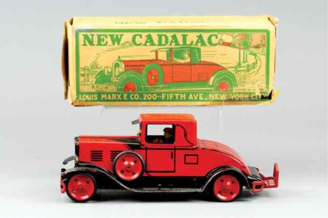 Appraisal: MARX BOXED ''NEW CADILLAC'' Lithographed tin done in red overall