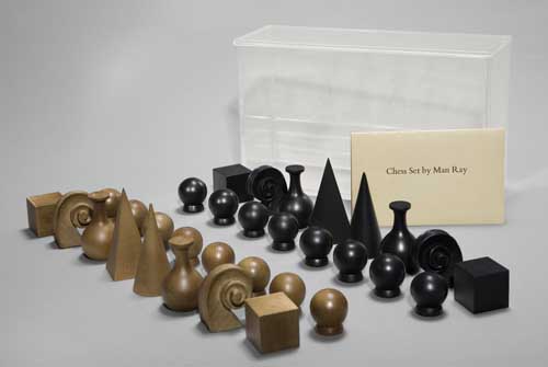 Appraisal: MAN RAY Chess Set Wooden chess set with pieces in