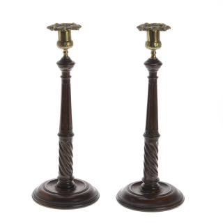 Appraisal: Pair English turned mahogany candlesticks Pair English turned mahogany candlesticks