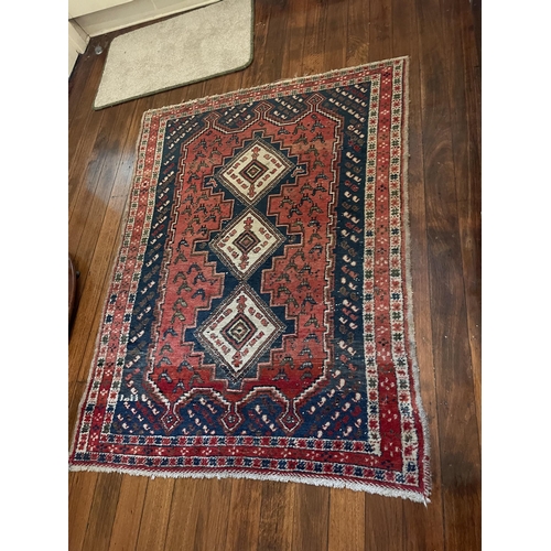 Appraisal: Vintage hand knotted wool carpet three central guls on a