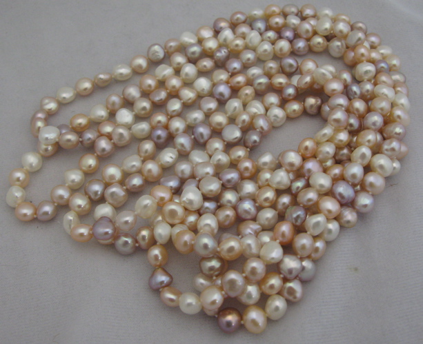 Appraisal: MASTOLONI BAROQUE MULTI-COLOR PEARL NECKLACE in length with pink violet